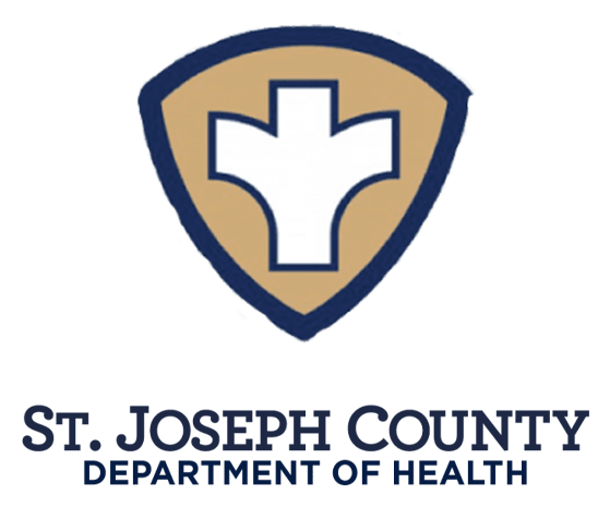 Logo of St. Joseph County Department of Health, featuring a shield with a stylized white medical cross in the center. Below, the name "St. Joseph County Department of Health" is written in blue text.